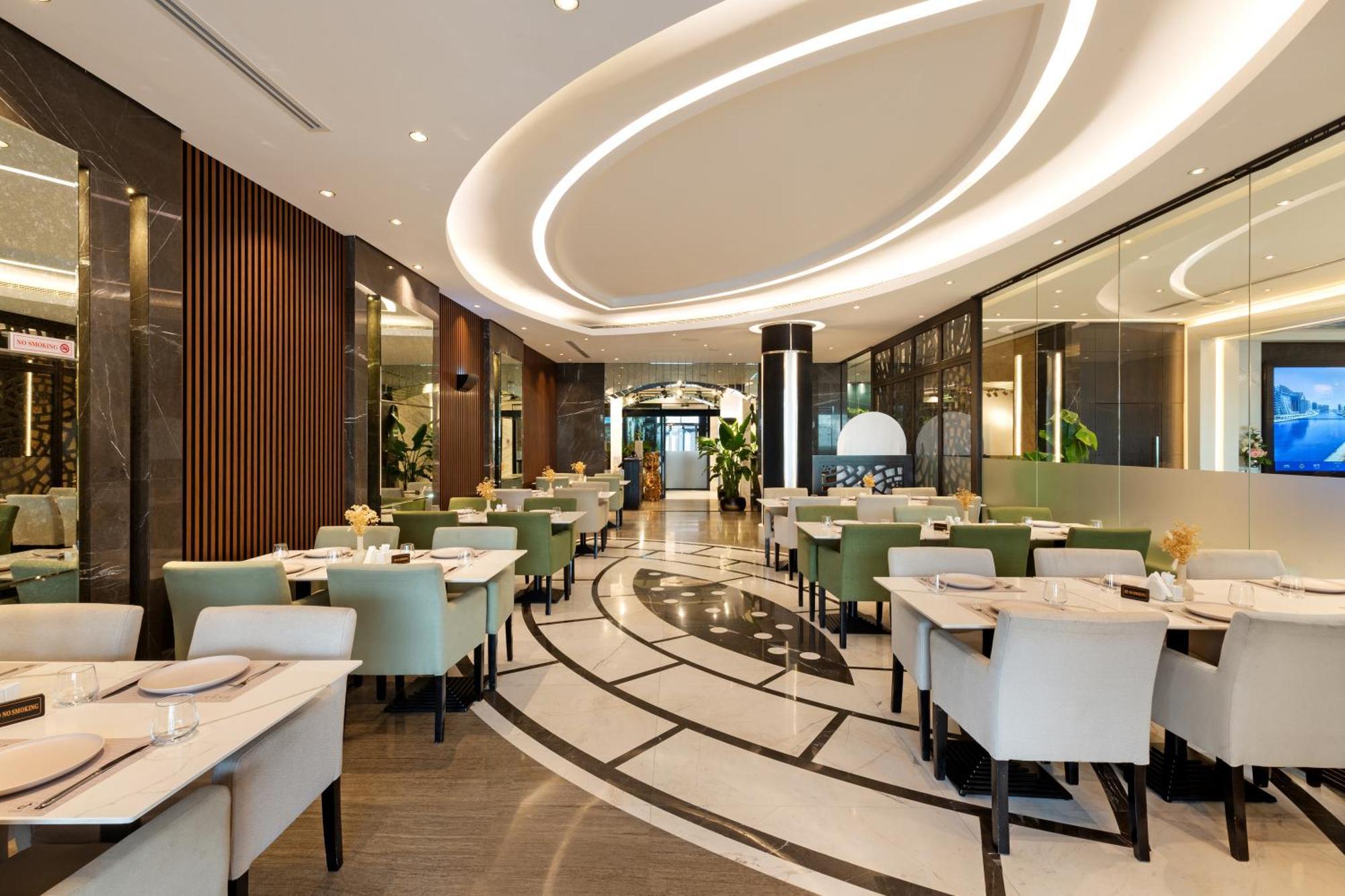 Royal Continental Suites Business Bay - Deluxe Apartments Dubaï Extérieur photo The restaurant