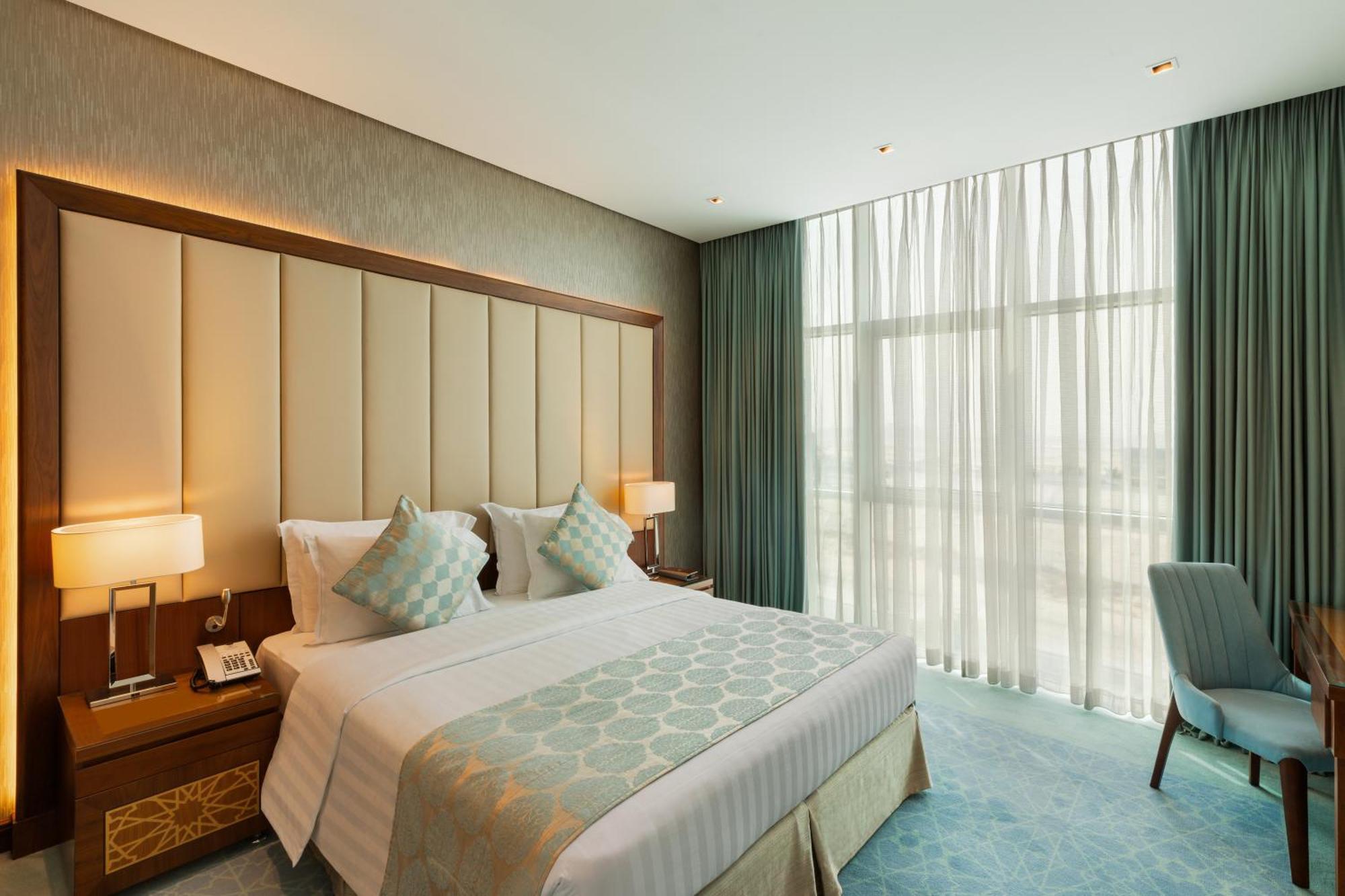 Royal Continental Suites Business Bay - Deluxe Apartments Dubaï Extérieur photo A bedroom at the hotel